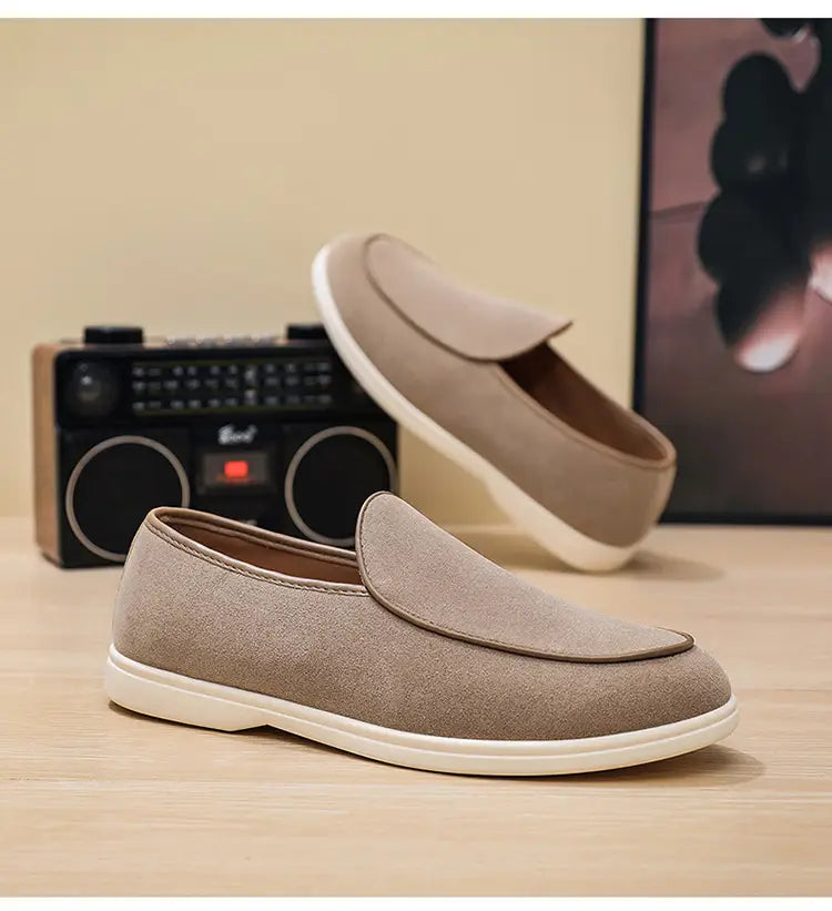 beige suede men’s slip on loafers with white rubber sole and contrasting brown stitching
