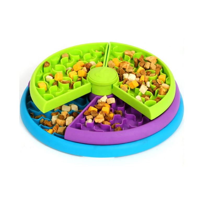 bol à alimentation lente pour tapis à lécher et puzzle distributeur pour chien 3-en-1 aux couleurs vives, en silicone, avec un design à plusieurs étages comprenant un moyeu vert central et des sections segmentées en vert citron, violet et bleu.