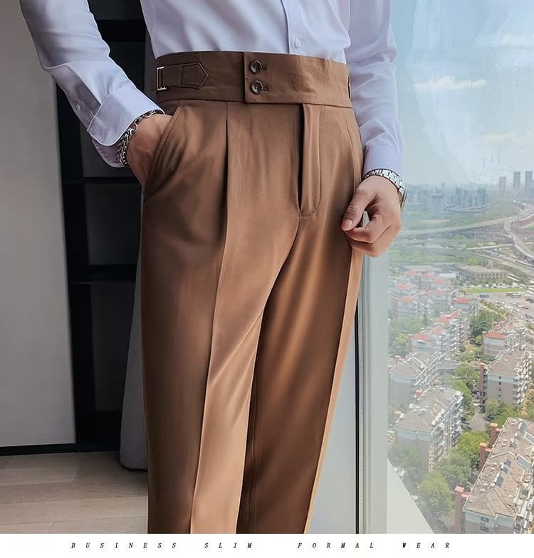 Tan slim-fit Korean style men trousers featuring a high waist and double-button belt detail ideal for formal occasions.