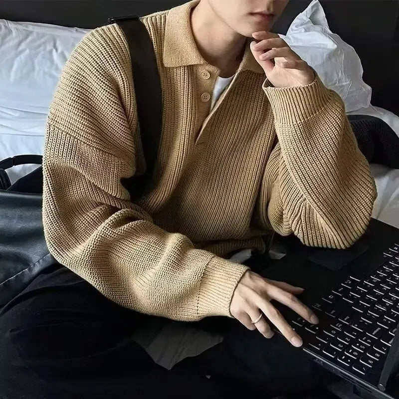 Beige ribbed knit long sleeve polo sweater for men featuring a collar and button front closure.