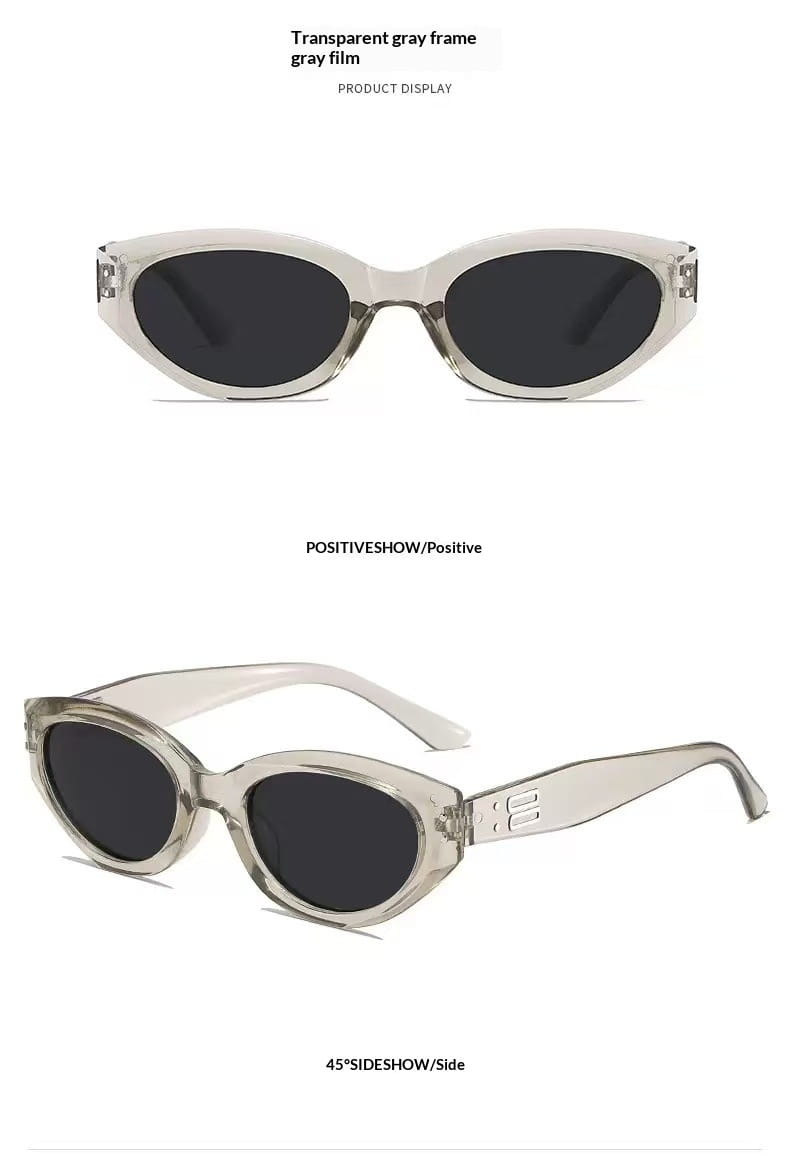 Retro cat eye uv400 sunglasses featuring transparent gray frames and dark lenses with a sleek modern design.