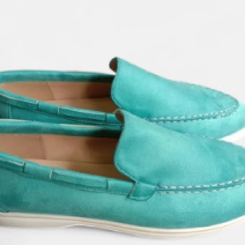 Men’s suede summer loafers in turquoise featuring a soft textured finish and contrasting light stitching along the seams for casual slip on wear.