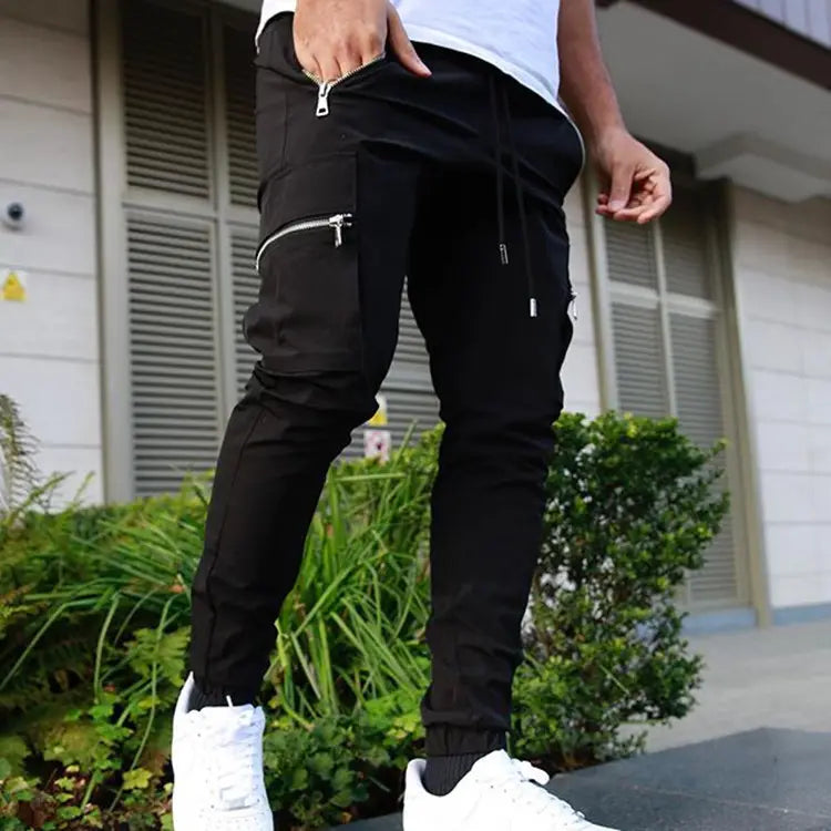 Black men’s zipper cargo joggers casual pants featuring zipper pockets and a drawstring waistband designed for comfort and utility.