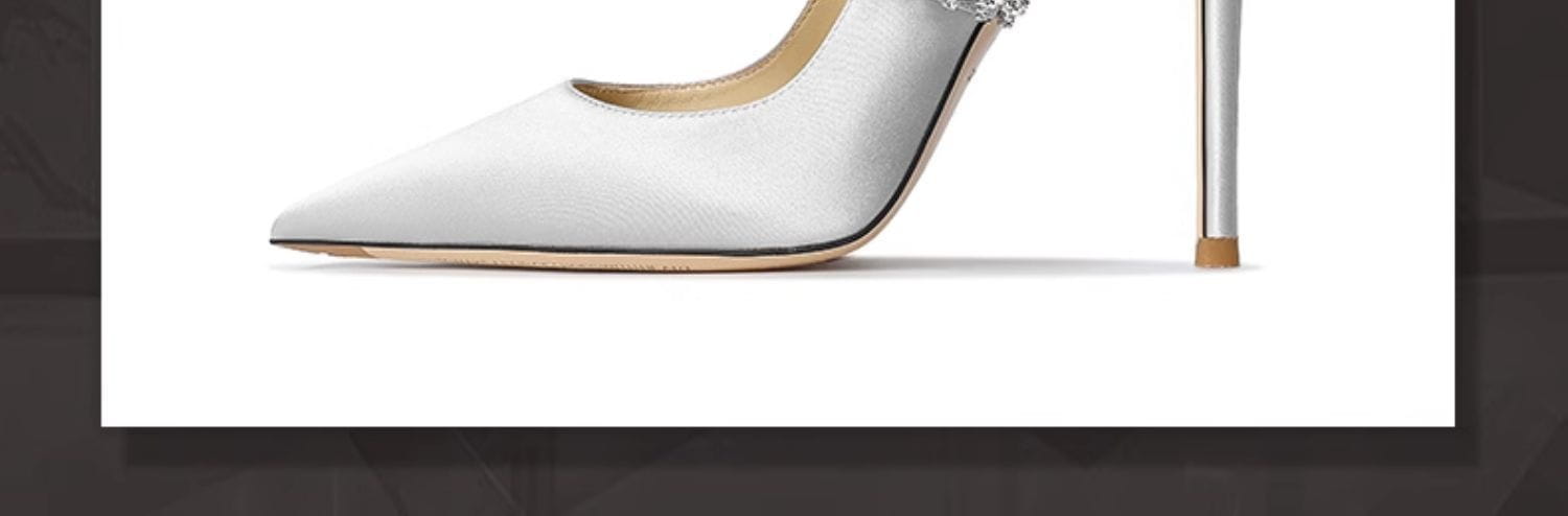 White satin pointed toe high heel with a silver stiletto and crystal embellishment from the crystal satin slingback pointed toe high heels collection.