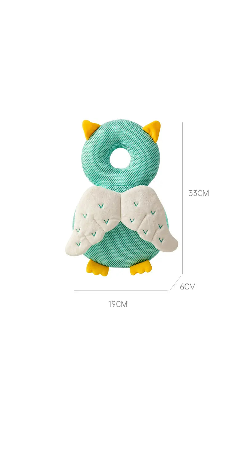 A soft teal owl-shaped baby head protector anti fall plush backpack cushion with yellow ears, feet, and embroidered wings designed for baby safety.