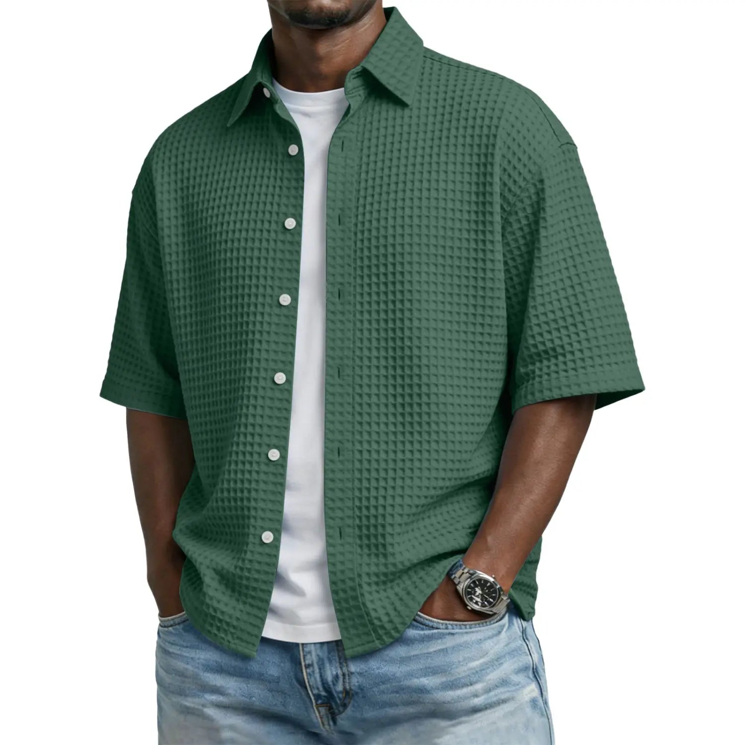 Dark green waffle knit short sleeve button up polo shirt for men made of textured knit fabric.