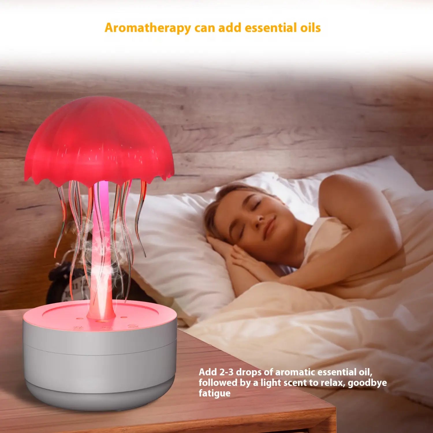 red jellyfish-shaped aromatherapy lamp with pink base and glowing tentacles functioning as a 7 color led essential oil diffuser and humidifier
