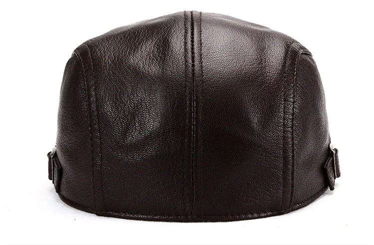 Dark brown leather flat cap for men with a structured five-panel design and adjustable side straps suited for warm winter use.
