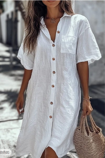 Elegant short sleeve button down linen shirt dress in white with a front pocket and linen fabric.