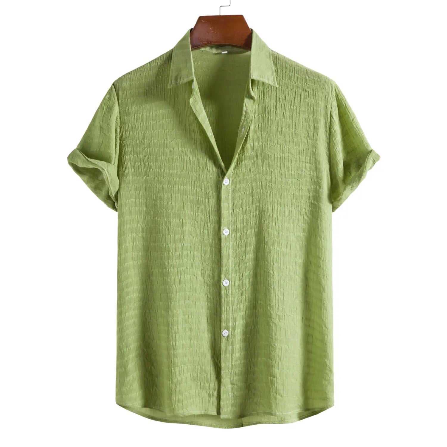 A light green men’s minimalist textured short sleeve grid shirt with white buttons and a textured fabric.