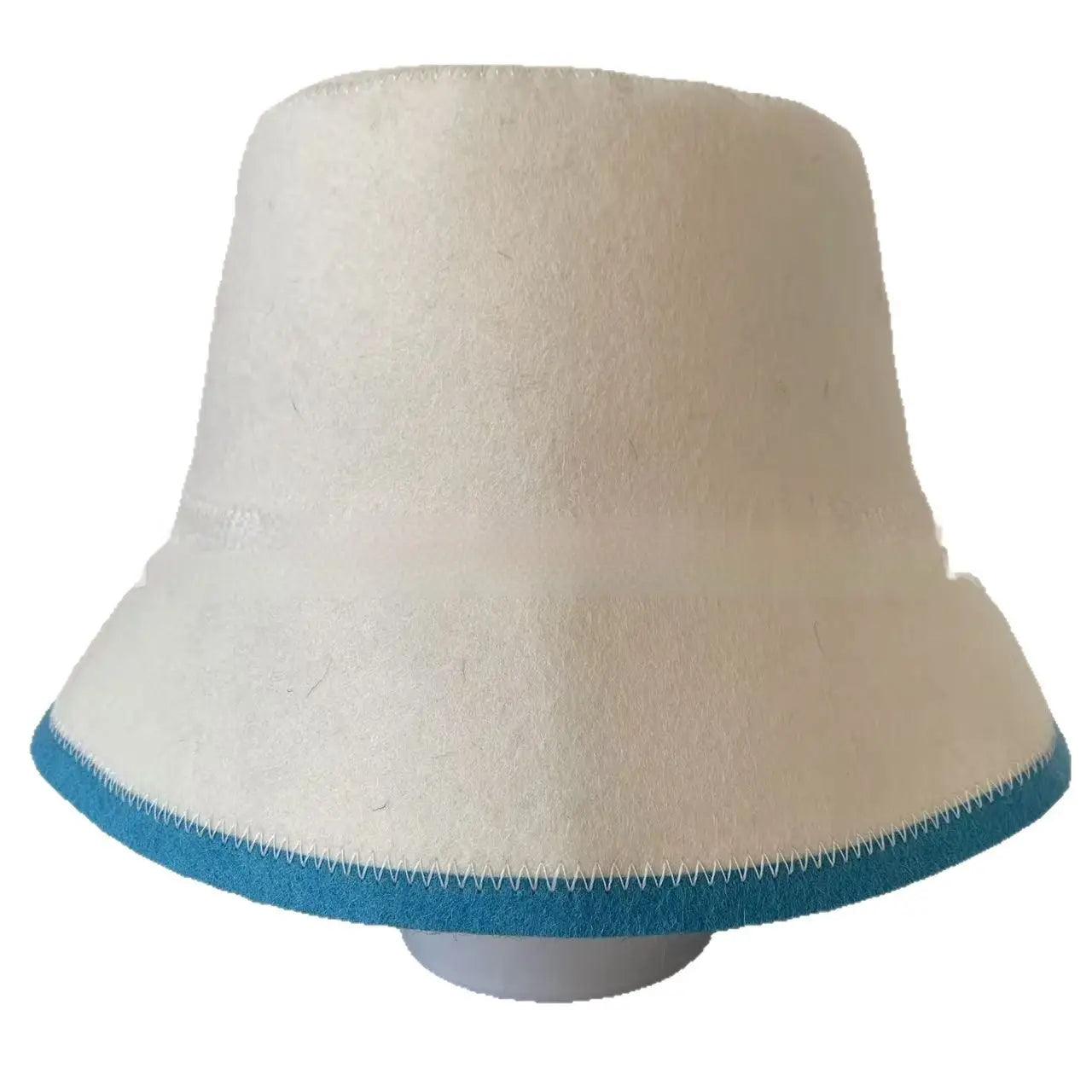 Cream-colored wool felt sauna cap bucket hat with contrasting teal trim and visible stitching along the brim.