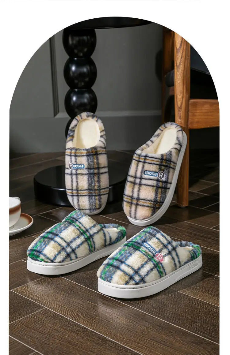 Unisex plaid fleece lined non slip indoor slippers with soft cozy texture and white soles.