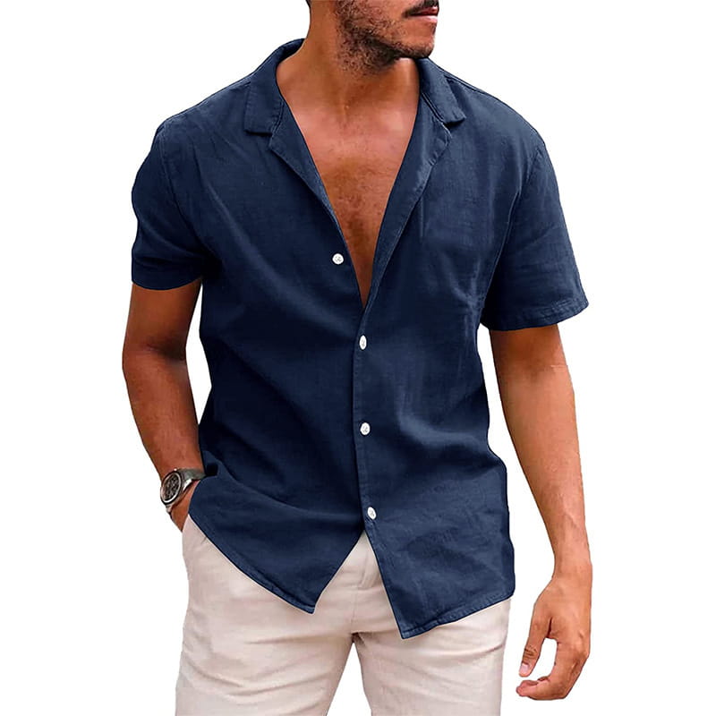 Men’s casual textured short sleeve button down shirt in navy blue with white buttons and a collar.