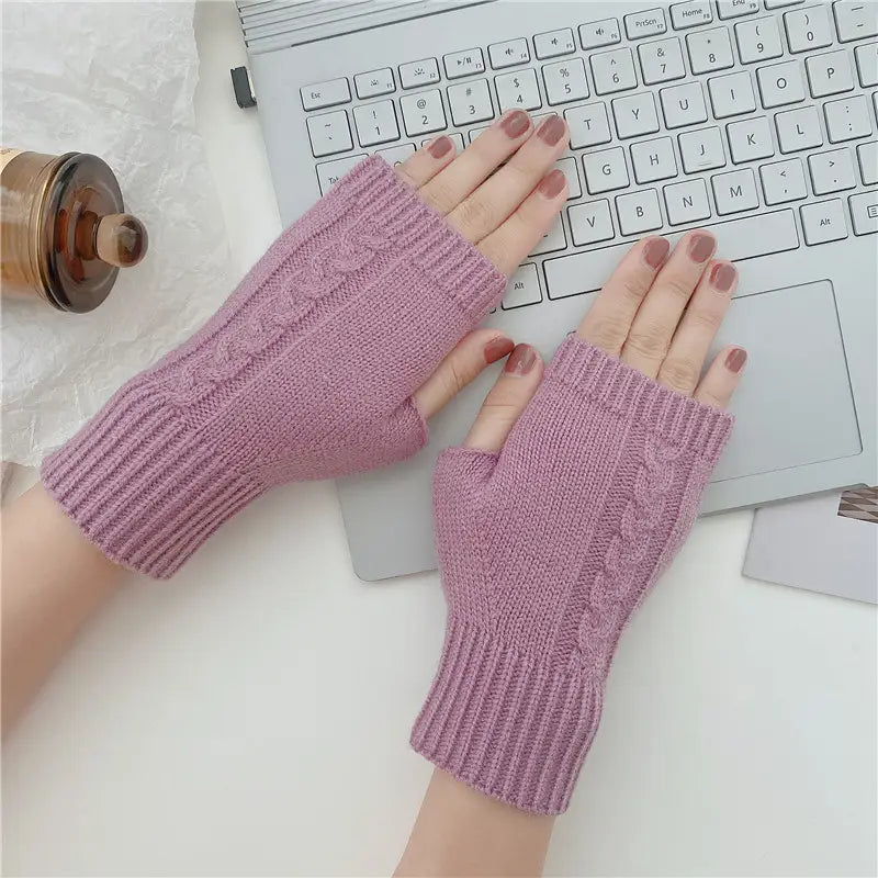 Soft lavender cable knit fingerless gloves made of woolen material with ribbed cuffs for unisex use.