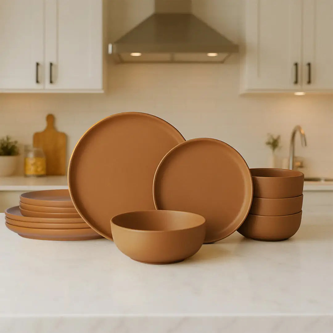 Stoneware dinnerware set 12 piece matte glaze for 4 featuring matte, warm terracotta earthenware plates and bowls.