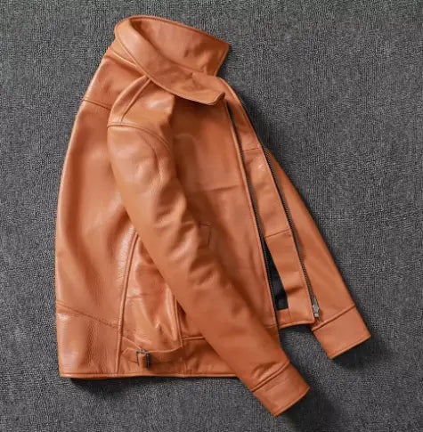 Men’s tan cowhide leather motorcycle jacket with classic collar and zipper closure.