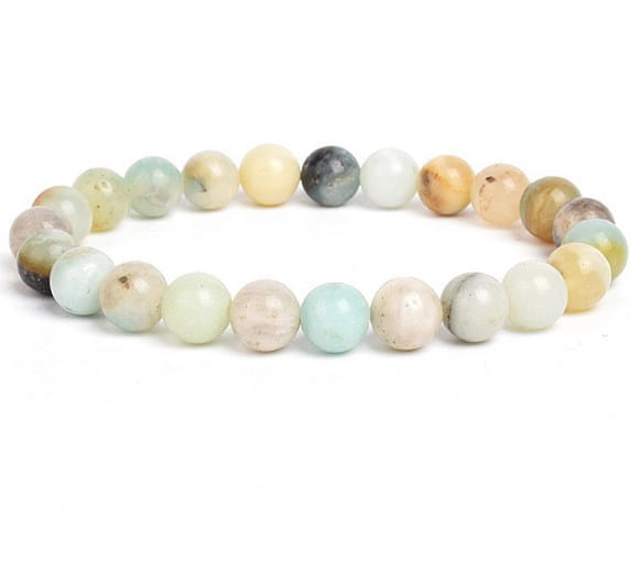 A delicate unisex 8mm polished agate and amethyst stretch bracelet featuring smooth round stones in soft pastel hues of pale blue creamy white warm beige and subtle gray tones.