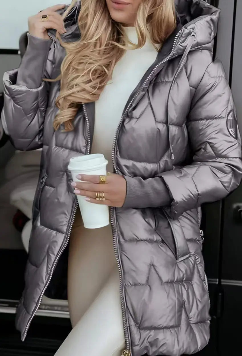 A sleek metallic gray quilted glossy hooded down puffer jacket with zipper closure.