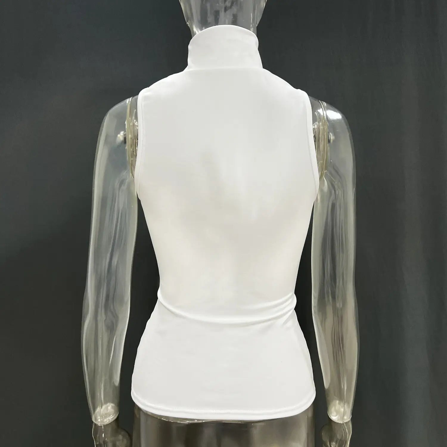 White sleeveless high-neck Gold Ring Halter stretch top made of smooth, form-fitting fabric.