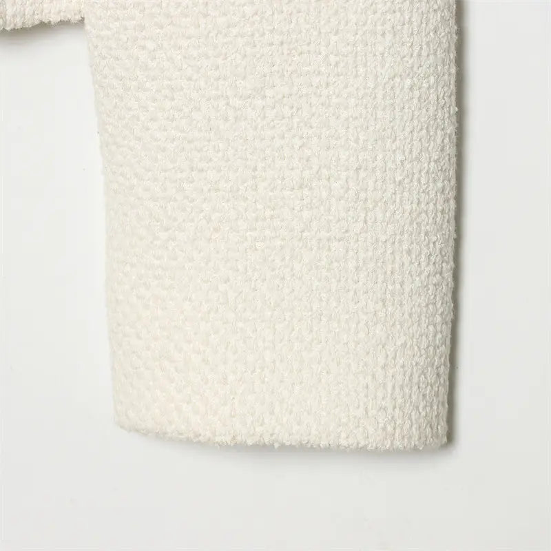 Cream tweed stand collar blazer featuring cream-colored plush textured fabric with a soft fuzzy surface.