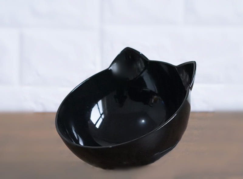 black glossy ceramic orthopedic cat ear pet bowl with pointed ears designed for slanted neck protection.