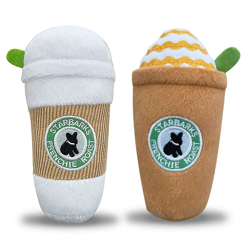 Two plush dog toys designed as Starbucks coffee cups with a white foam top and a yellow-and-white striped foam top in a dog plush coffee cup squeaky toy 2 pack.