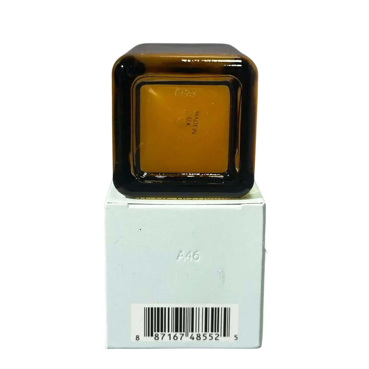 Amber glass face serum 100ml bottle with black rim and square shape resting on white box for skin care face use