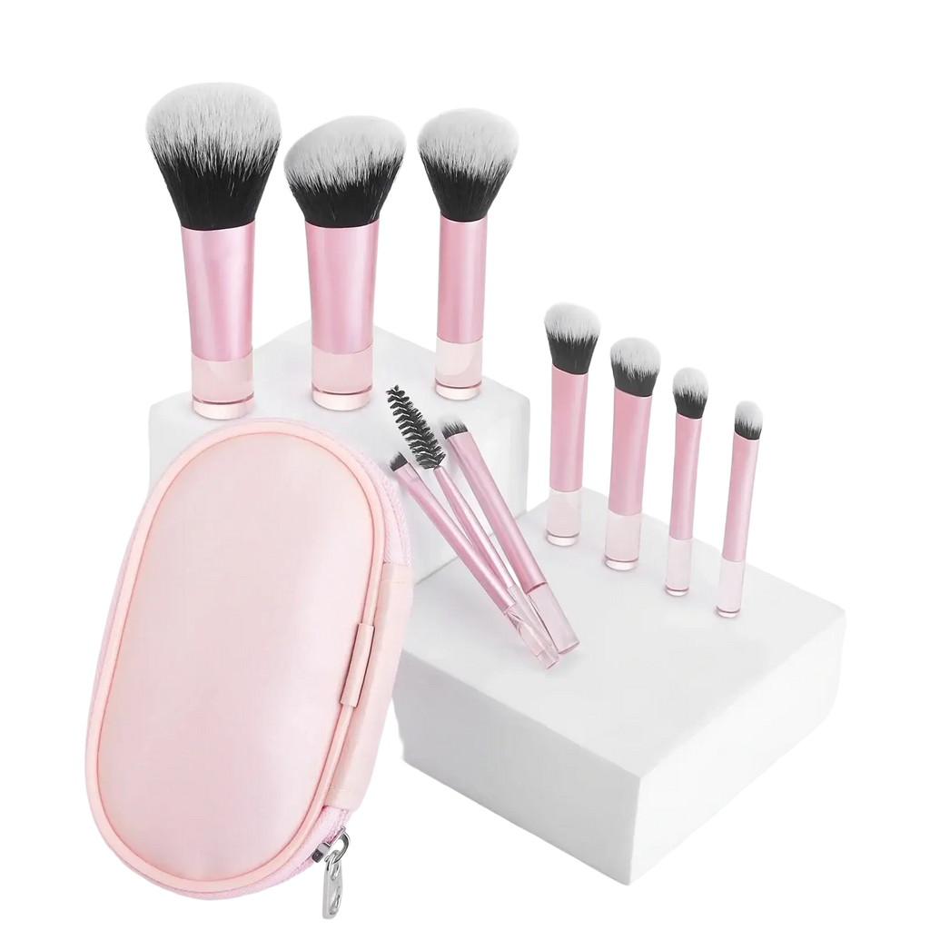 Pink makeup brush set with metallic handles and black and white bristles with matching pink case for face serum 100ml skin care