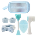 Light blue silicone and plastic facial cleansing brush with bear-shaped head in skincare set for gentle exfoliation