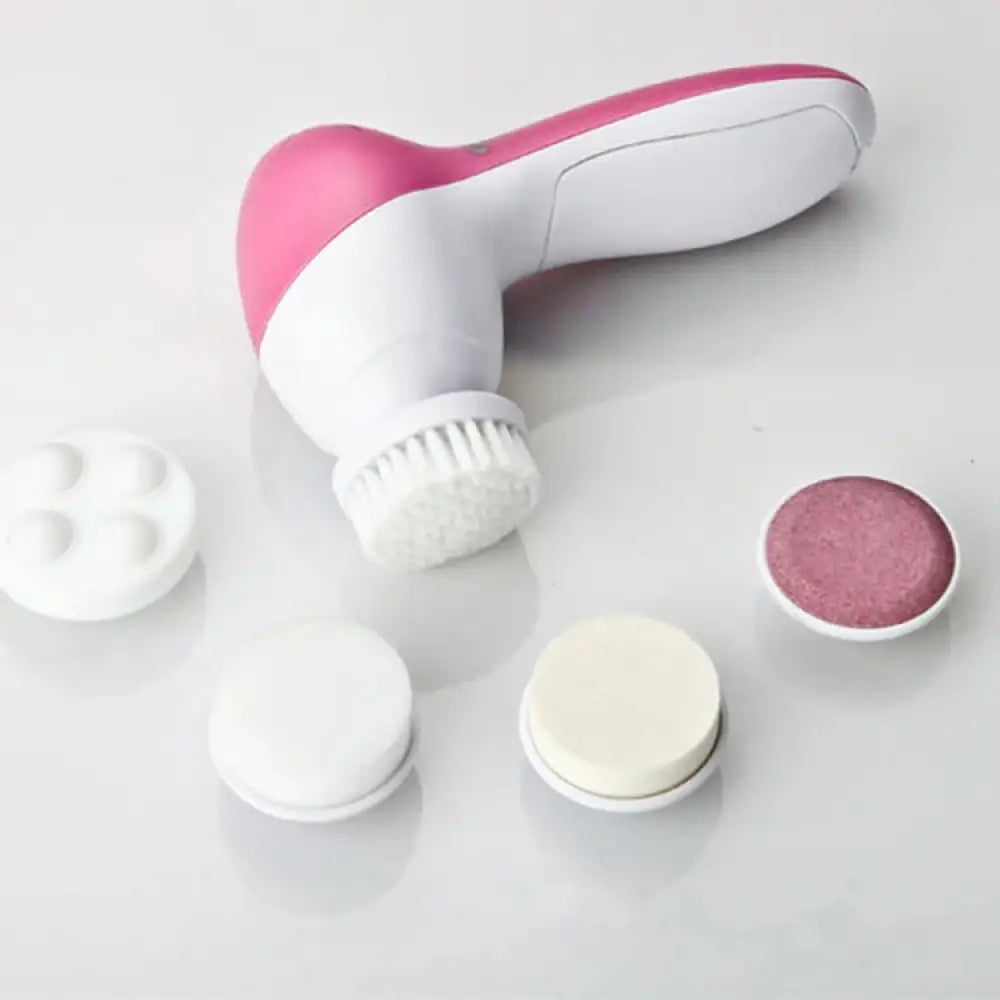 Rechargeable electric facial cleansing brush in pink and white with interchangeable heads for deep skin cleansing and massaging