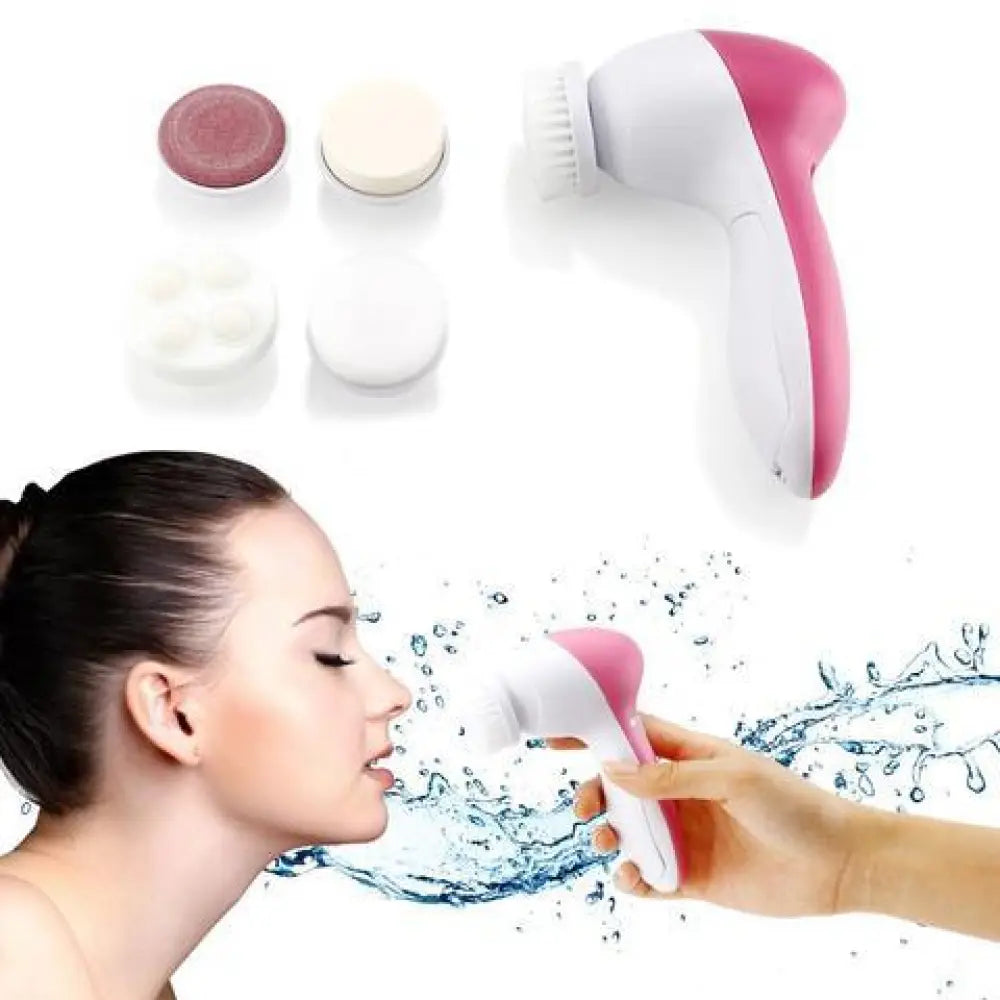 Rechargeable electric facial cleansing brush and massager in pink and white with interchangeable silicone heads for gentle cleansing