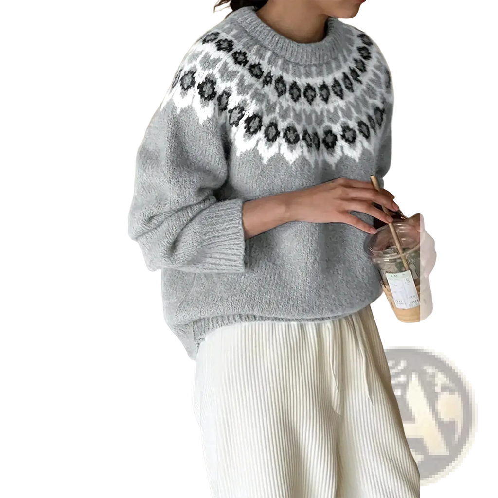 Fair Isle geometric knit sweater in gray with white and black pattern across chest made of knit material