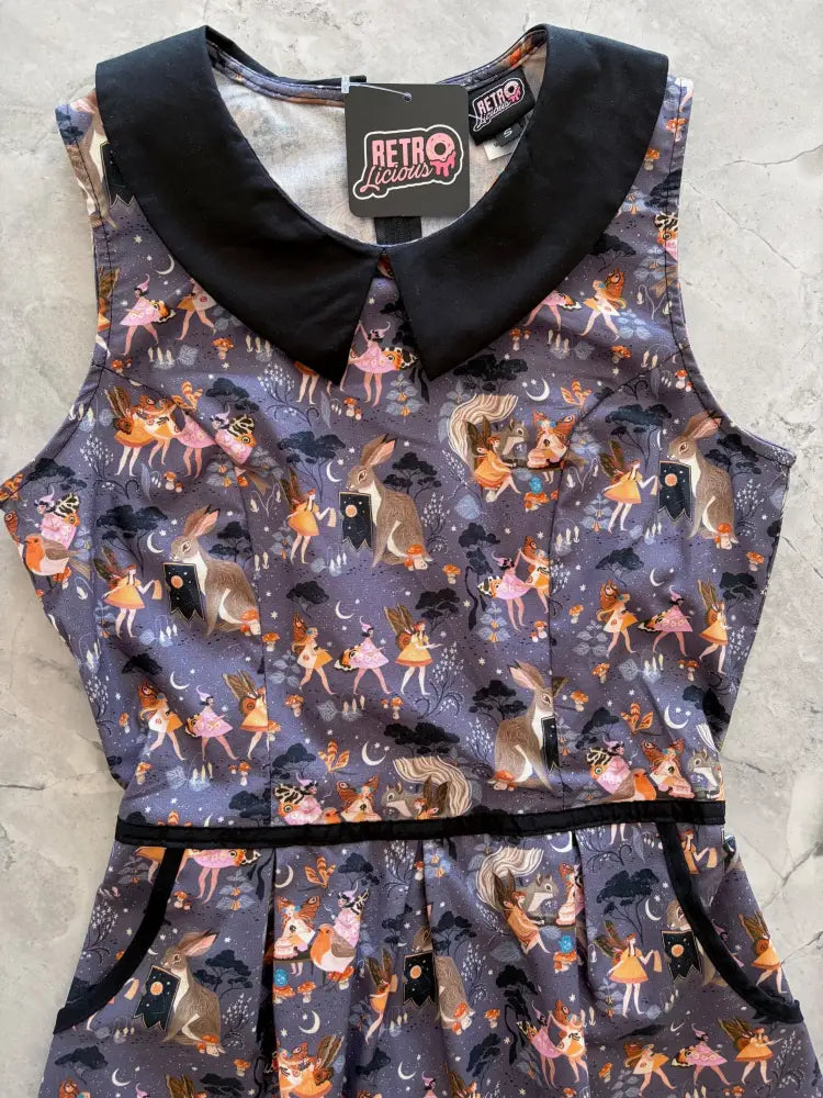Fairies retro a-line cotton dress sleeveless dark purple with black peter pan collar waistband and pastel fairy print