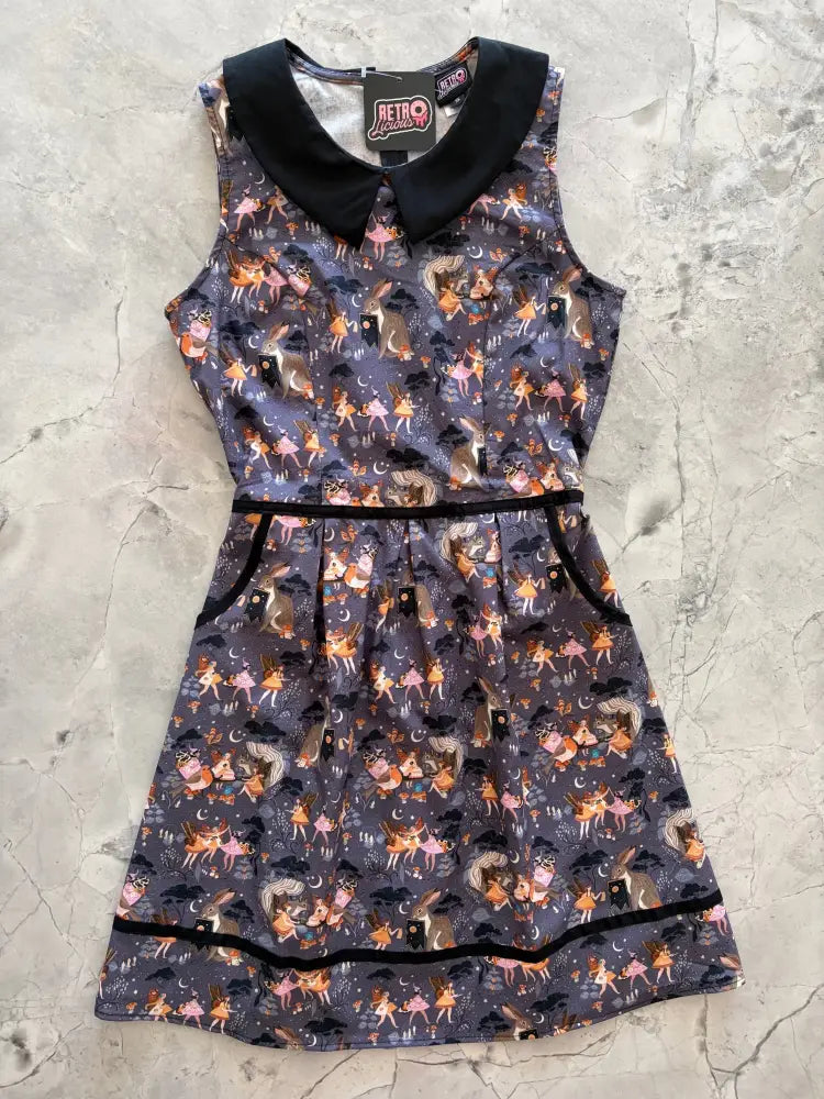 A sleeveless dark gray cotton fairies retro A-line dress with black peter pan collar and pink gold fairy rabbit print