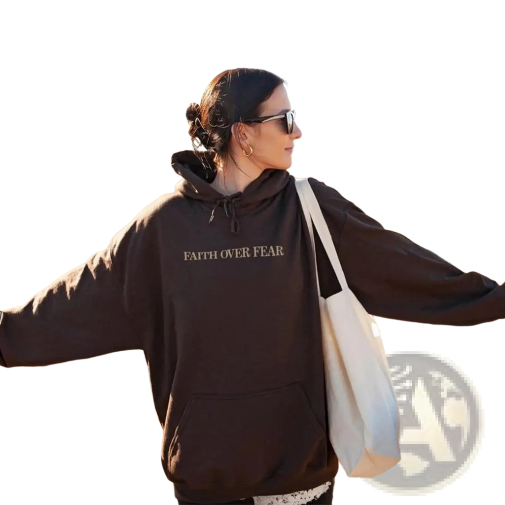 Dark brown oversized hoodie with faith over fear printed in light font for christian aesthetic and comfort wear