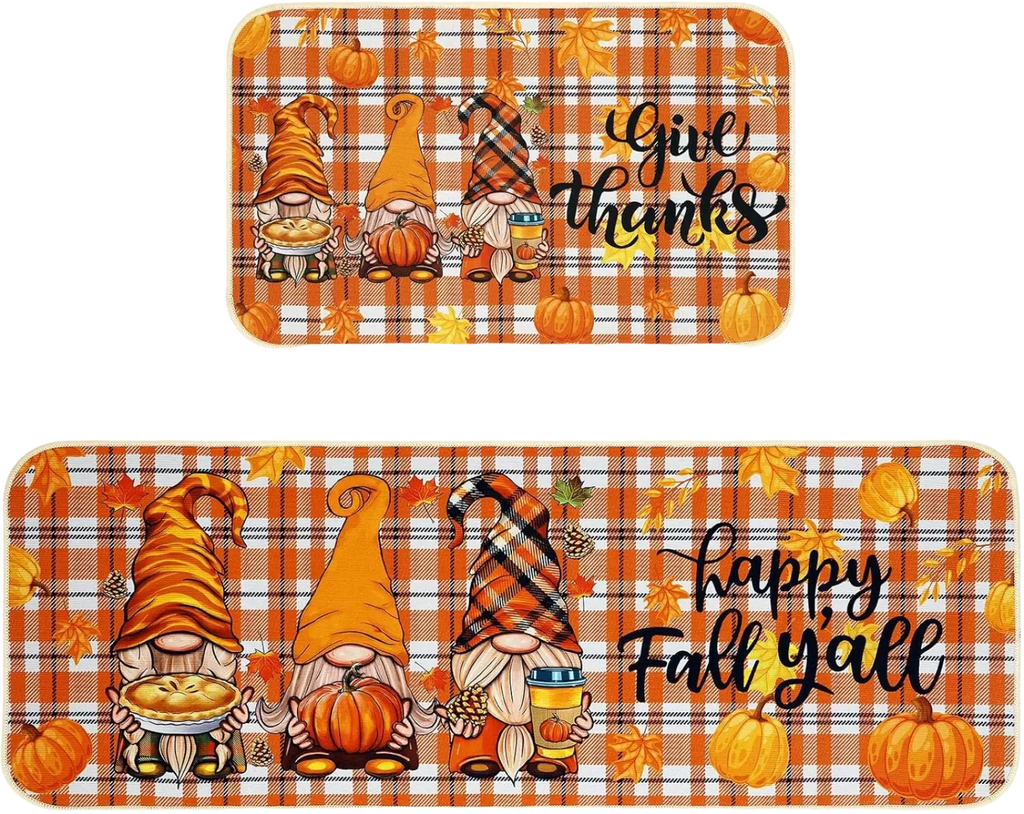 Orange and white plaid fall kitchen mat with three cartoon gnomes and autumn-themed accessories for thanksgiving