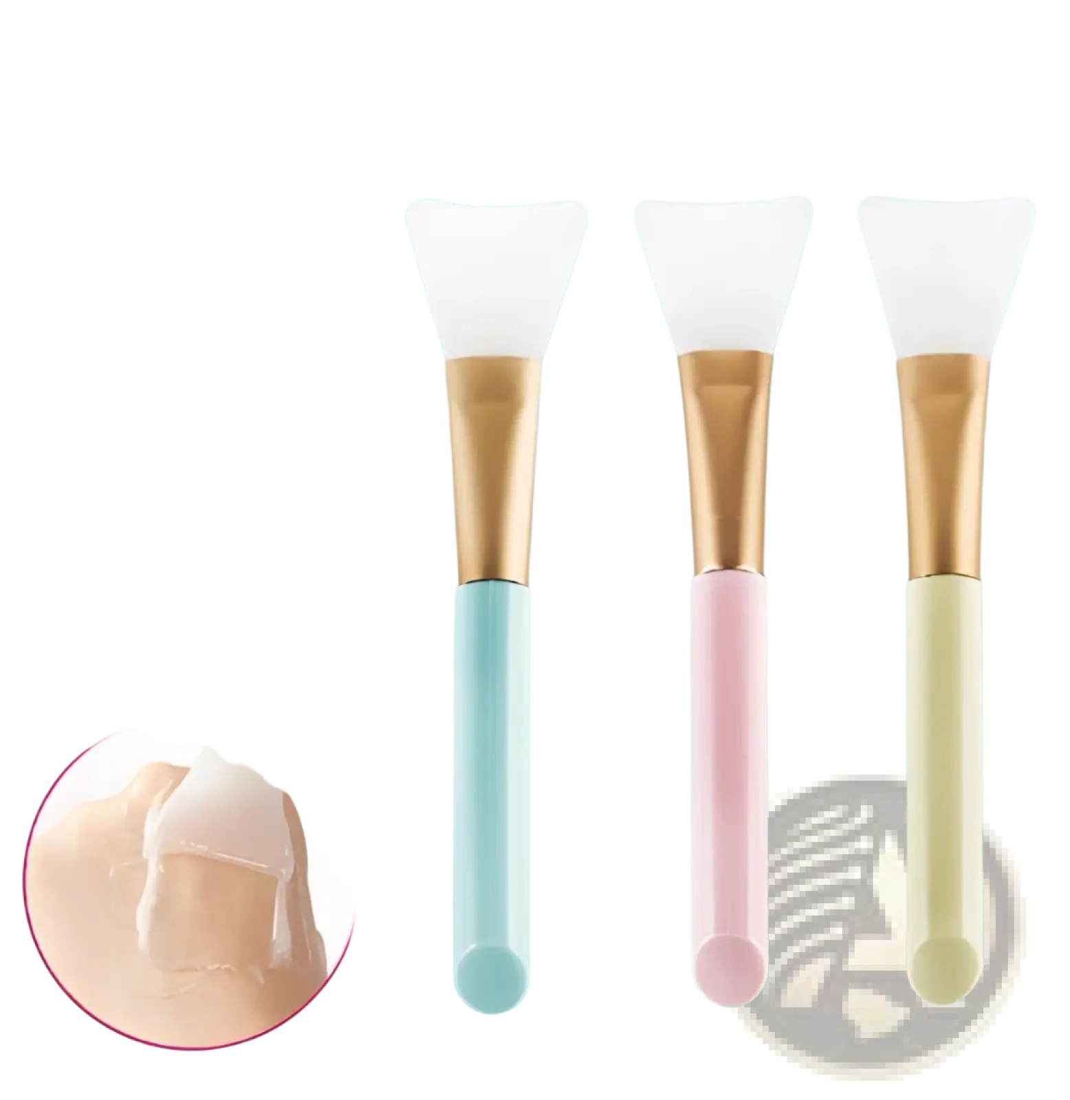 Set of three pastel-colored silicone facial mask applicators with gold-toned iridescent gradient metal handles for makeup application