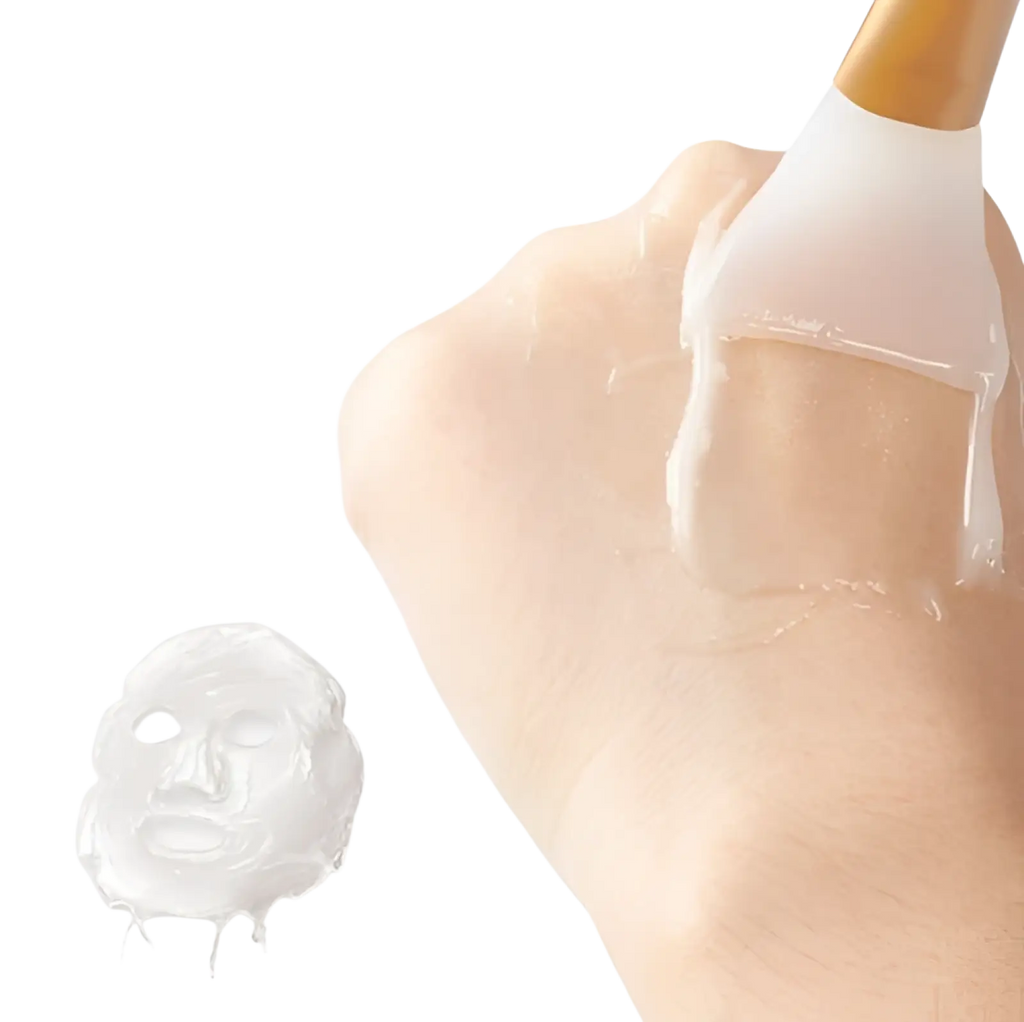 A translucent gel facial mask applied with a white silicone brush from a fan makeup brush set with iridescent handles