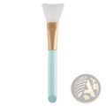 A mint green and gold facial mask applicator with a soft translucent silicone head from fan makeup brush set iridescent gradient handle 3pc