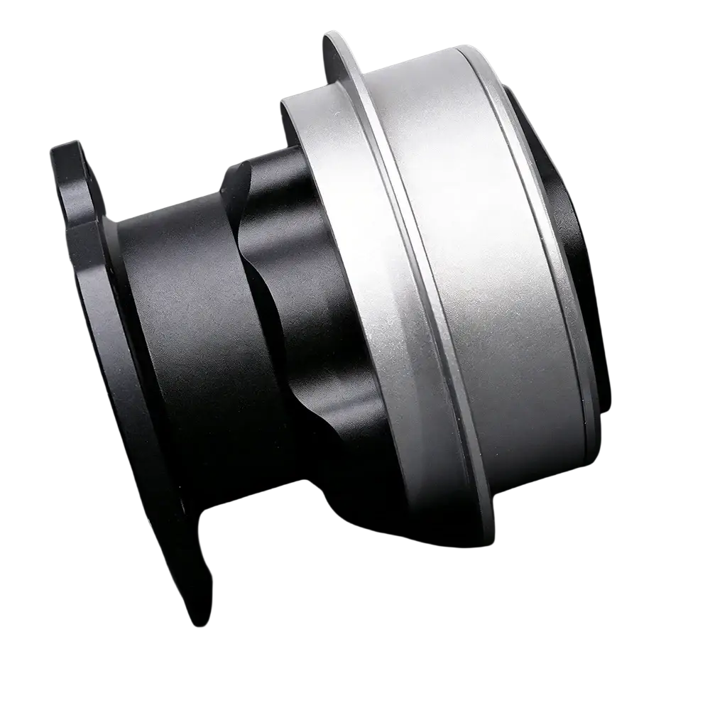 Fanatec qr2 quick release hub adapter is a black and silver metallic camera lens mount adapter with a sleek cylindrical design