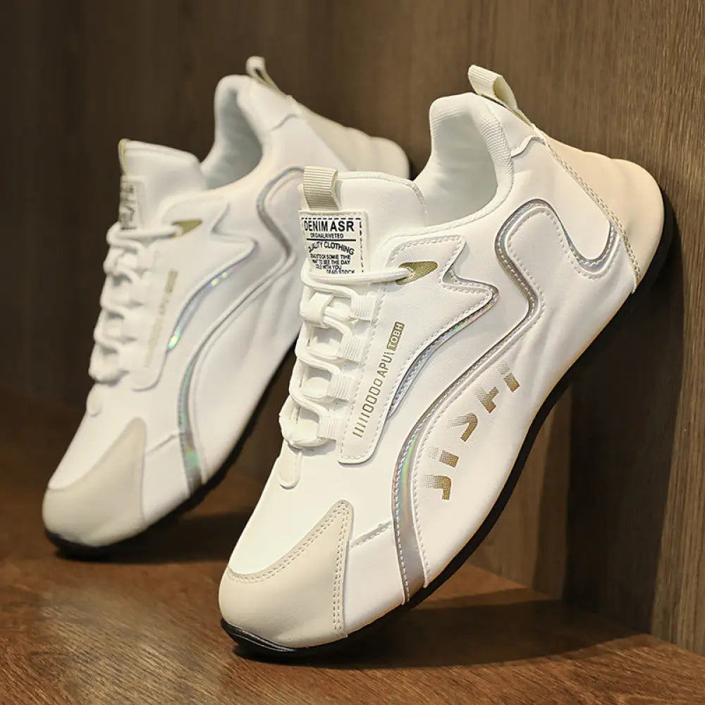 Men’s colorblock breathable mesh sport sneakers in white with silver reflective accents gold lettering and black rubber soles