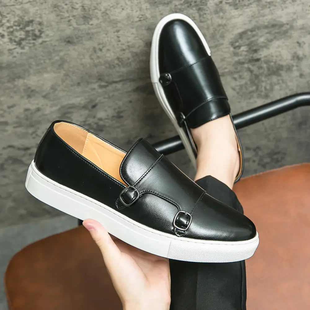 Men’s double monk strap leather fashion loafers in black with white rubber sole and two buckle details
