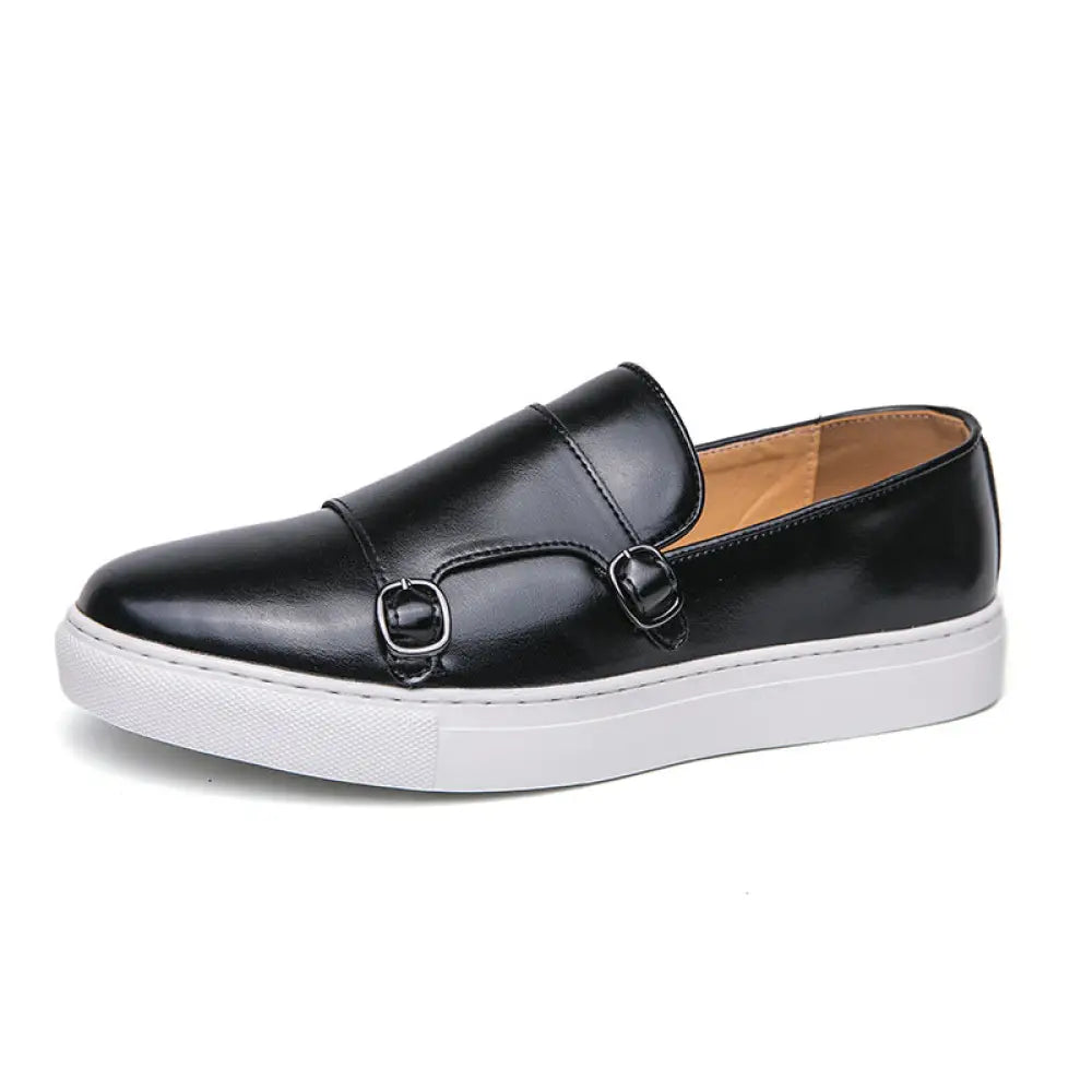 Mens double monk strap leather fashion loafers in black with white rubber sole and two silver buckle closures