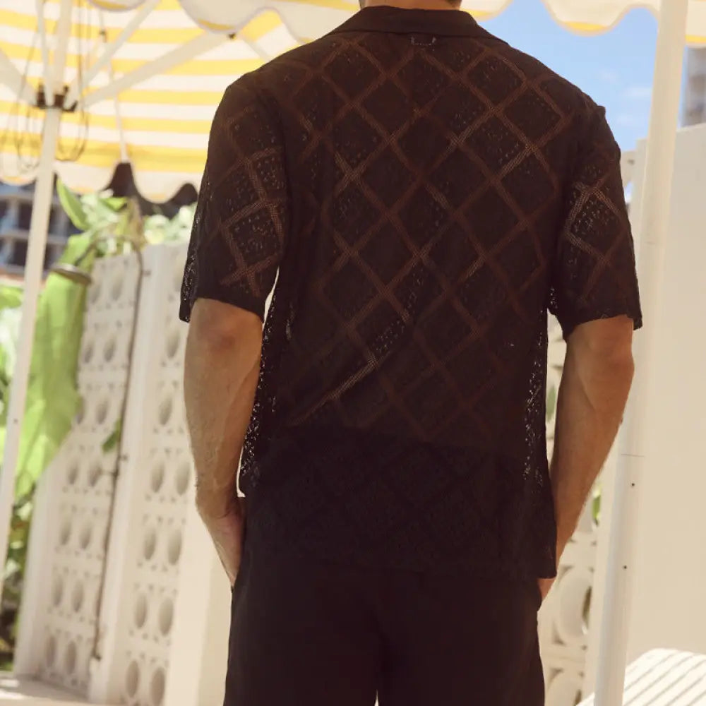 Men’s black short-sleeved breathable shirt with sheer diamond-patterned mesh design for ventilation