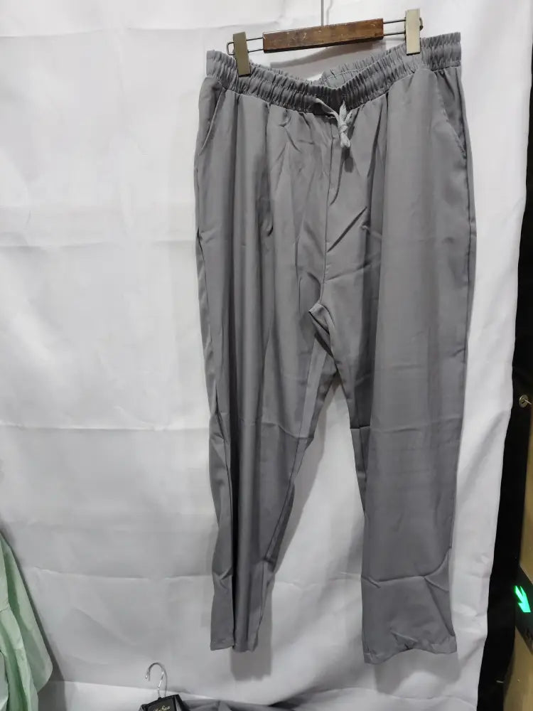 Men’s korean slim fit smart casual business blazer paired with gray drawstring pants featuring elastic waistband and lightweight fabric