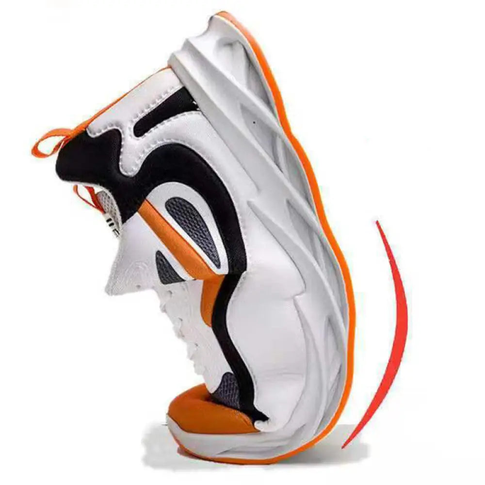 Men modern mesh non slip athletic running sneaker in white black and orange with a chunky sole design