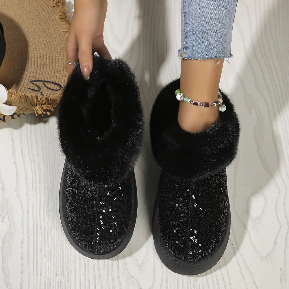 Black sequined women’s winter platform slipper boot with plush faux fur lining for cold weather comfort