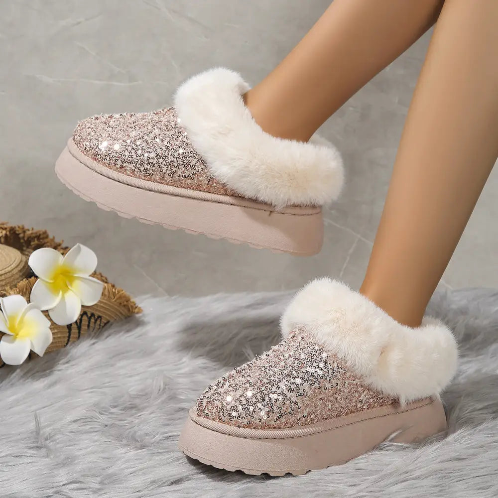 Women’s rose gold sequined slip-on mules with plush white faux fur trim and chunky platform soles for winter use