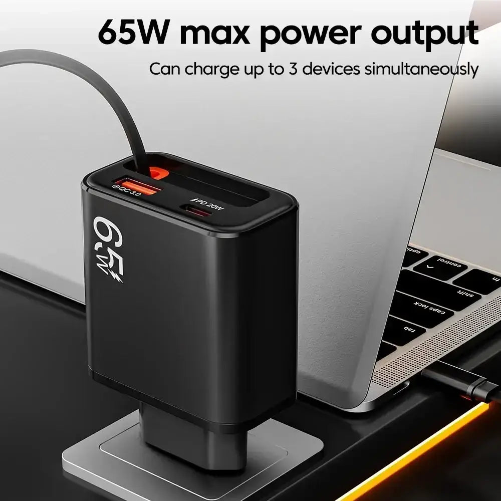 Black rectangular 65w usb-c fast charging phone charger with multiple ports and retractable cable for convenient use