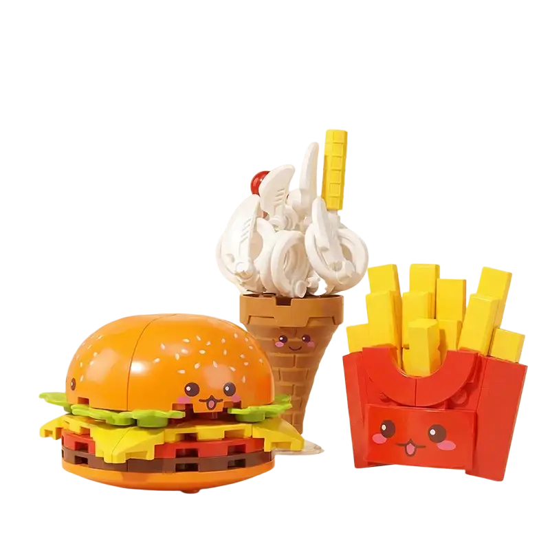 Bright orange lego-style fast food micro building block toy burger with green lettuce yellow cheese and red tomato slices featuring a smiling face